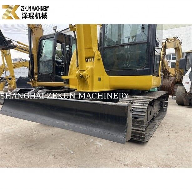 Komatsu PC56-7 mini graafmachine met 5 ton bedrijfsgewicht en duurzame dieselmotor