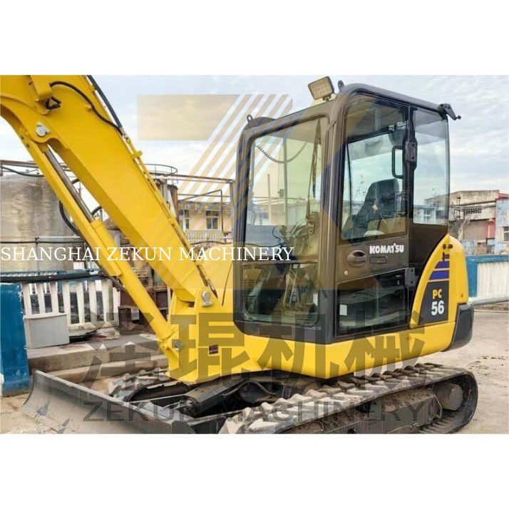 Tweedehands Komatsu PC56 graafmachine met een emmercapaciteit van 0,2 m3 en 0-2000 werkuren