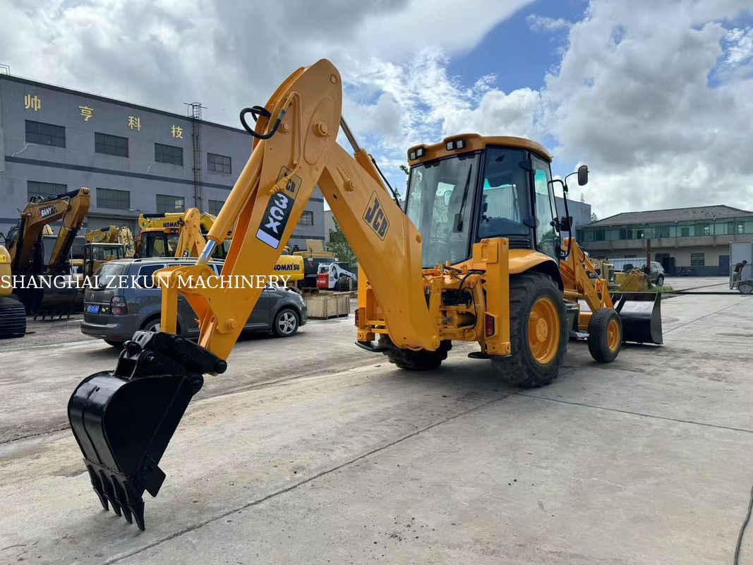 2001 JCB 3CX Graafmachine met achterlader met 95 L/min hydraulisch systeem debiet