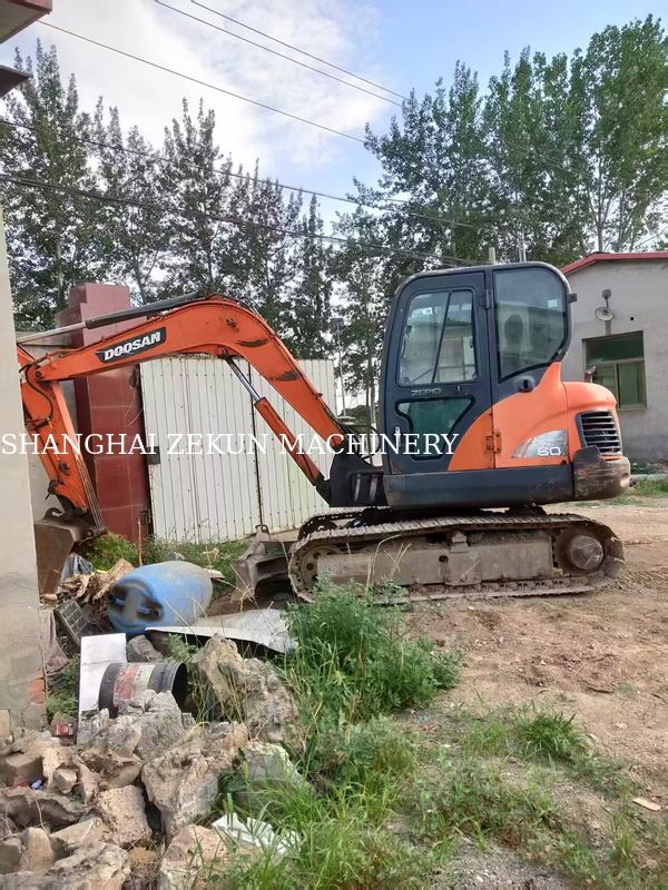2013 Doosan DX60 Graafmachine met hydraulische druk 27,5 MPa en maximale graafhoogte 800 mm