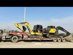 Kirgizië - 1 XCMG XE60DA en 1 Volvo EC140